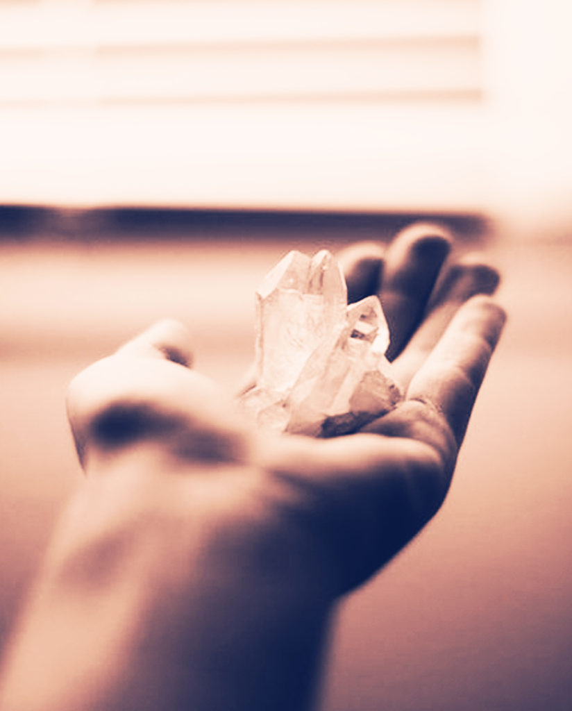 hand with crystal